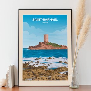 Peut inclure: Une affiche de voyage vintage représentant une tour rose sur une île rocheuse dans l'océan bleu. L'affiche porte le texte "SAINT-RAPHAËL FRANCE" en haut.