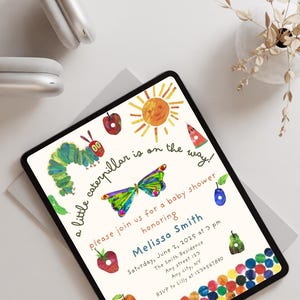 May include: A baby shower invitation featuring a colourful illustration of a caterpillar, butterfly, sun, and watermelon. The text reads "a little caterpillar is on the way!" and "Please join us for a baby shower honouring Melissa Smith". The invitation includes the date, time, location, and RSVP information.