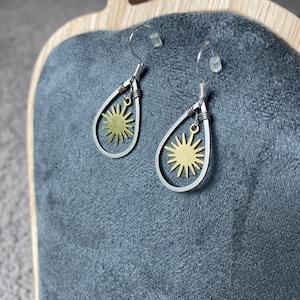 Mixed metal sun earrings. Silver and gold earrings. Sun earrings. Everyday earrings. Earrings that match everything.