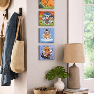 May include: A set of three ceramic mugs with a speckled, matte finish. The mugs are in shades of cream, light gray, and dark gray. Each mug has a simple, minimalist design, perfect for coffee or tea.