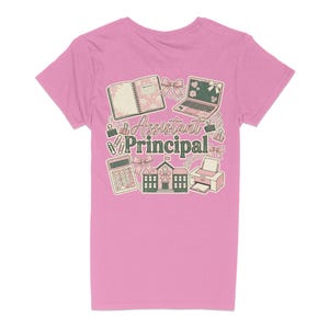 May include: Pink t-shirt featuring a design for an Assistant Principal. The design includes a laptop, calculator, notebook, schoolhouse, and printer. The words "Assistant Principal" are in the center of the design.