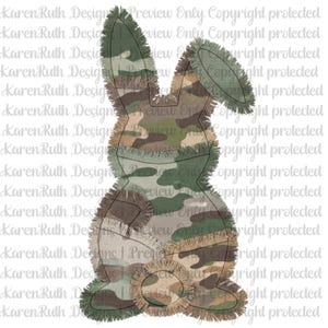 May include: A decorative Easter bunny silhouette in a camouflage pattern. The bunny is made of patches with frayed edges, featuring shades of green, brown, and tan. The design is a rustic, country-style decoration.