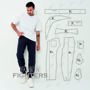 May include: A white short-sleeved t-shirt and navy blue sweatpants paired with a technical sewing pattern layout featuring various garment pieces, labels, and dashed cutting lines, with the text FASHION FIGHTERS printed at the bottom.