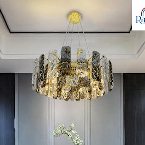 Subtle elegance: Modern 4-light wagon wheel design with a crystal pendant chandelier