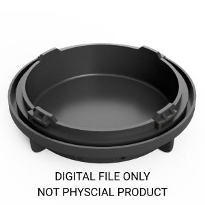 May include: A black, circular object with a recessed interior and a raised outer rim. The object has a series of small, rectangular protrusions around the rim. The text "DIGITAL FILE ONLY NOT PHYSICAL PRODUCT" is printed below the object.