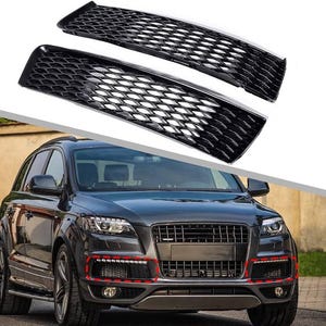May include: Two black car grilles with a honeycomb pattern are shown above a dark grey SUV. The grilles are rectangular with a glossy finish. The SUV has a black front grille and headlights.