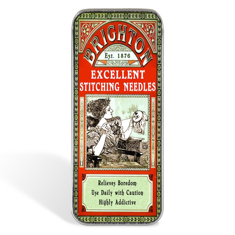 May include: A rectangular metal tin featuring a vintage-style label with red, green, and cream colors. The text reads BRIGHTON Est. 1876 EXCELLENT STITCHING NEEDLES. Below, a graphic shows a person sewing, with text stating Relieves Boredom, Use Daily with Caution, Highly Addictive.