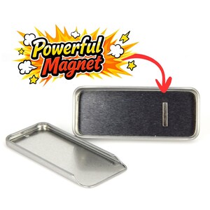 May include: Two rectangular silver-toned metal name badge holders with rounded corners. One holder is empty, while the other features a dark, brushed-finish interior with a small, centered rectangular magnet. A graphic above reads Powerful Magnet.