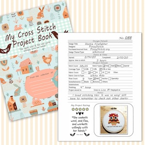 May include: A cross stitch project book with a whimsical design featuring a house, a bird, and a rabbit. The book is titled "My Cross Stitch Project Book" and includes the quote "She seeks wool & flax and works willingly with her hands." The book also includes a cross stitch pattern for a fire fighter owl with the text "Firefighters are hot!" The pattern is rated 5 stars.
