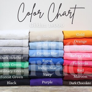A color chart displays a variety of crewneck sweatshirt options, including gray, white, sand, black, red, blue, and more. Each color is shown offering a range of vibrant and neutral tones to choose from for your perfect sweatshirt.