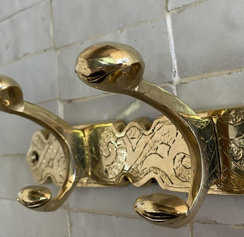 Brass Wall Hook,
Vintage Coat Hook,
Antique Brass Hanger,
Wall Mounted Hooks,
Rustic Home Décor,
Brass Entryway Hook,
Hat and Coat Hook,
Victorian Style Hook,
Towel Hook Bathroom,
Brass Hook,
Handcrafted Hook,
Decorative Wall Hook,