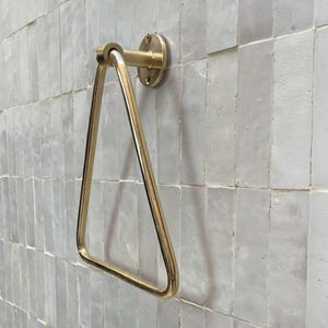 Handmade solid brass bathroom accessory with triangular design