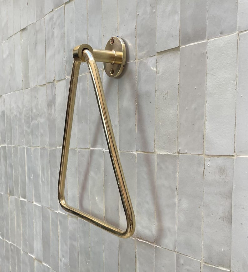 Handmade solid brass bathroom accessory with triangular design