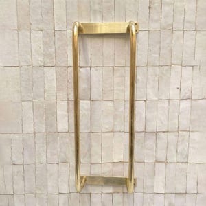 Unlacquered brass towel rack
Solid brass bathroom towel holder
Handmade brass wall towel rack
Luxury brass bathroom accessory
