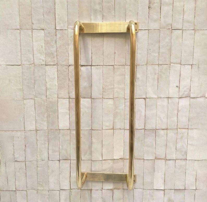 Unlacquered brass towel rack
Solid brass bathroom towel holder
Handmade brass wall towel rack
Luxury brass bathroom accessory
