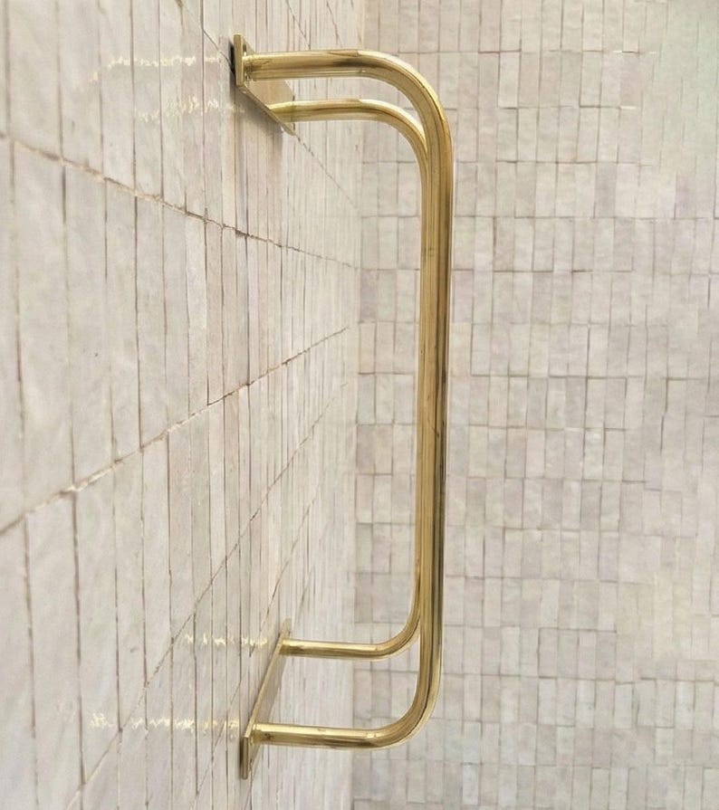 Unlacquered brass towel rack
Solid brass bathroom towel holder
Handmade brass wall towel rack
Luxury brass bathroom accessory