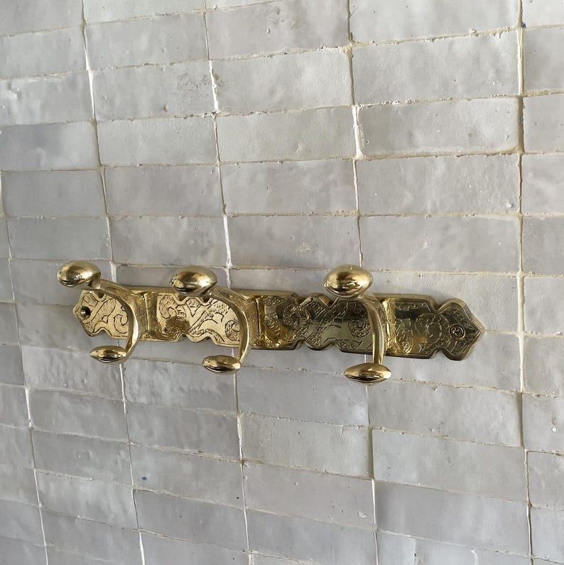 Brass Wall Hook,
Vintage Coat Hook,
Antique Brass Hanger,
Wall Mounted Hooks,
Rustic Home Décor,
Brass Entryway Hook,
Hat and Coat Hook,
Victorian Style Hook,
Towel Hook Bathroom,
Brass Hook,
Handcrafted Hook,
Decorative Wall Hook,