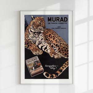 May include: Vintage Murad cigarette advertisement featuring a reclining leopard with a spotted coat. The poster includes the text "MURAD THE TURKISH CIGARETTE" and a pack of cigarettes. The background is a dark blue and black.