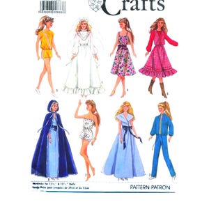 May include: Simplicity Crafts pattern for doll wardrobe. The pattern includes designs for various outfits, such as a romper, a wedding dress, a floral dress, a red dress, a cape, a playsuit, a blue gown, and a blue tracksuit. The pattern is for 11.5" and 12" dolls.