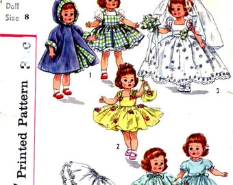 May include: Simplicity sewing pattern number 2294 for making doll clothes. The pattern includes instructions for making a hooded cape, a gingham dress, a wedding dress, a yellow dress, a nightgown, and a blue dress. The pattern is for dolls size 8.