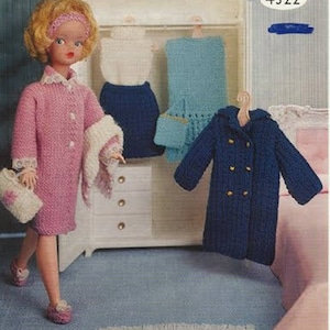 May include: A vintage image featuring a doll dressed in a pink knitted coat, matching shoes, and a handbag. A wardrobe displays knitted doll clothing in white, blue, and navy. The image includes the text "Ladyship WOOLS" and "4322".