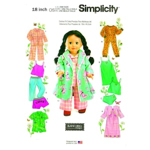 May include: A Simplicity sewing pattern for making clothes for 18-inch dolls. The pattern includes a variety of outfits, including pajamas, a robe, a dress, and a skirt and top. The pattern is designed by Blaine Heigl Designs.