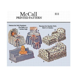 May include: McCall's printed pattern 811 for doll furniture. The pattern includes instructions for making a bassinet, vanity table, sofa, and two beds for dolls 4 to 7 inches tall.