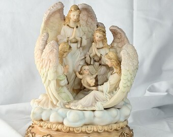 Christmas Around the World Angel Nativity Figurine Musical Baby Jesus 9"