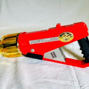 SUPERZELDZAME 2001 Power Rangers Wild Force Red Ranger Lion Blaster Speelgoedpistool met Lichtjes, Geluiden, WERKT, Anime Retro jaren 80, 90, 00