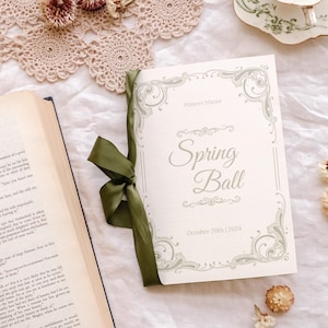 Könnte beinhalten: Eine weiße Einladungskarte mit einem dekorativen Rand und dem Text "Spring Ball" im Princes Manor am 20. Oktober 2024.