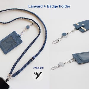 May include: A blue braided lanyard with a badge holder and a retractable reel. The set includes a card holder with a clear window and a metal clip. Text on the image reads Lanyard + Badge holder and Free gift with a small icon of a clip.