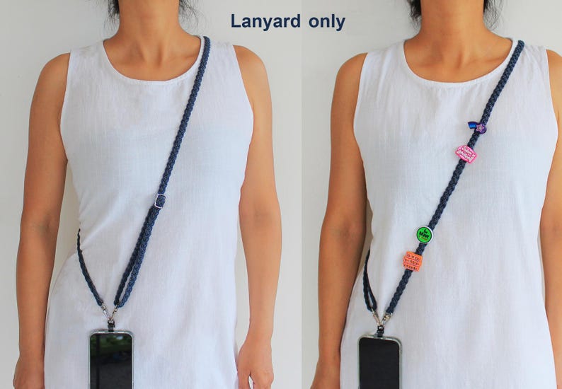 May include: A dark blue braided crossbody lanyard with a silver-toned metal adjuster and two swivel clips attached to a smartphone. The right view shows the same lanyard decorated with four small colorful charms in various shapes.