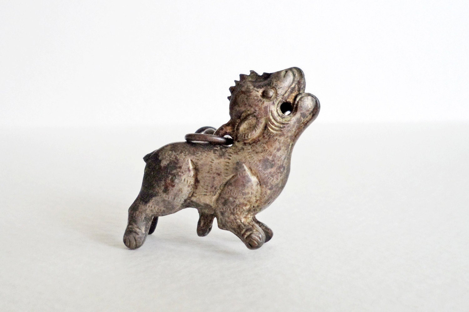 Silver lion charm, probably part of chatelaine, early or mid-20th century