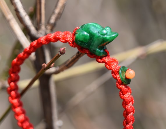 ***** EIGHT GREEN FROGS ON A RED TASSEL LUCKY CHARM  ****** 