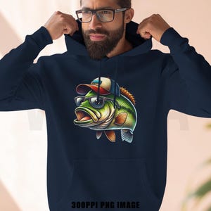 May include: Navy blue hoodie featuring a cartoon bass wearing sunglasses and a baseball cap. The fish is green, orange, and white. The hoodie has a drawstring hood and a front pocket.