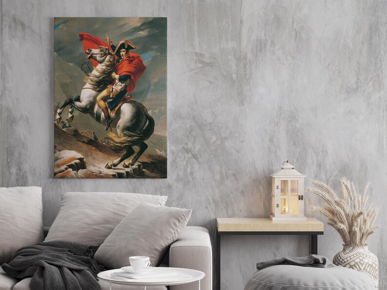May include: A painting of a man on horseback, riding through a mountainous landscape. The man is wearing a red coat and a bicorne hat. The horse is white with a brown mane and tail.