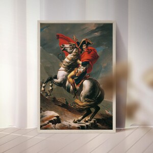 May include: A painting of a man on horseback, wearing a red coat and a bicorne hat. The horse is white with a black mane and tail. The background is a mountainous landscape.
