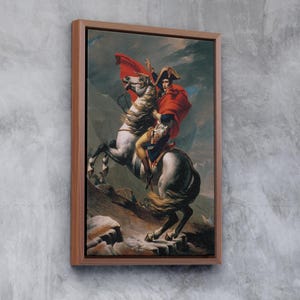 May include: A painting of a man on horseback, wearing a red cloak and a bicorne hat. The horse is white and the man is riding up a mountain.