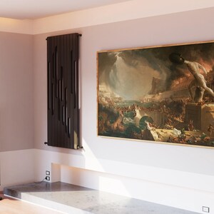 May include: A large framed painting of a dramatic scene with a figure standing on a pedestal, surrounded by people and a city in the background. The painting is in a room with a modern radiator and a floor lamp.
