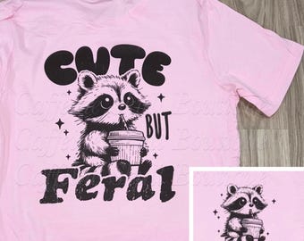 Cute but feral raccoon, cute shirt, cute raccoon shirt, feral raccoon drinking coffee, feral girlie, cute raccoon