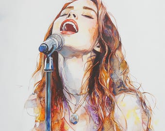 May include: A watercolor painting of a woman singing into a microphone. Her eyes are closed and her mouth is open in song. Her hair is long and flowing, and she is wearing a simple necklace. The background is a light wash of color.