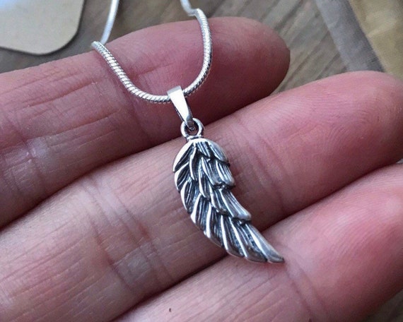 Angel feather pendant deals