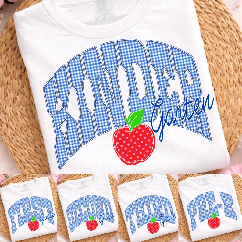 May include: White t-shirts with school-themed designs. The main shirt features the word "Kindergarten" in blue gingham print, with a red apple graphic. Additional shirts display "First Grade", "Second Grade", "Third Grade", and "Pre-K" with apple graphics.