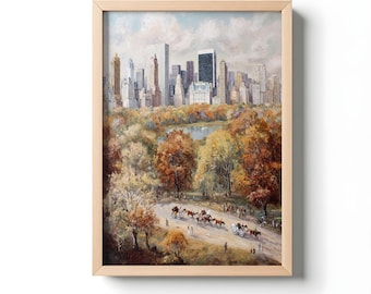 Peut inclure: Œuvre encadrée représentant un paysage urbain avec un parc au premier plan. La peinture présente une ligne d'horizon de grands bâtiments, un parc avec des arbres aux couleurs d'automne et des calèches sur une route. Le cadre est en bois clair.