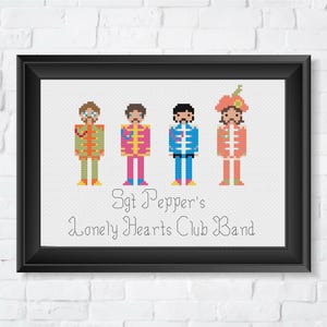 May include: Cross-stitch pattern of the Beatles as Sgt. Pepper's Lonely Hearts Club Band. The four band members are depicted in their iconic outfits from the album cover, with colorful details and pixelated designs.