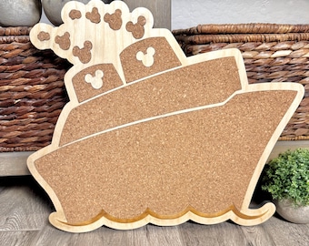 May include: A wooden ship-shaped corkboard with Mickey Mouse head cutouts. The ship has a light wood frame and a cork interior. The ship's smokestacks and top deck feature Mickey Mouse silhouettes. The corkboard is designed to be a decorative and functional item.