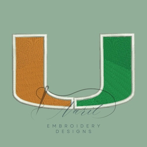 May include: Embroidered letter U in white with an orange and green color scheme. The letter is outlined in white.