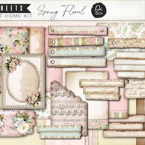 Op de afbeelding: Een verzameling scrapbookpapier en versieringen met een bloemig thema. De kit bevat papieren met patronen, labels en decoratieve elementen in zachte roze, groene en crèmekleuren. De tekst "Spring Floral" is zichtbaar.