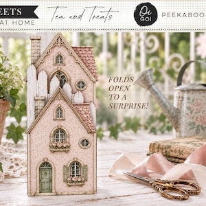 May include: A pink paper craft house with a green door, arched windows, and flower boxes. The text reads 5 SHEETS PRINT AT HOME, Tea and Treats, Oi GOI PEEKABOO FOLIO, and FOLDS OPEN TO A SURPRISE. The house features a textured roof and chimney.