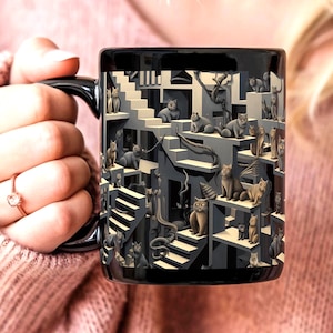 May include: Black ceramic coffee mug with a graphic of a cat-filled Escher-like impossible staircase. The cats are in various shades of gray and white.